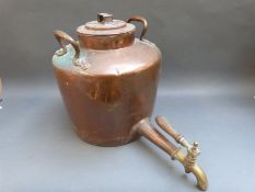 A large copper Samovar / hot water container with brass tap, height 34cm,