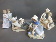 Four Nao figures including sweethearts,