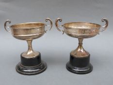 Two similar hallmarked silver trophy cups, one for Ludlow Castle Tennis Club,