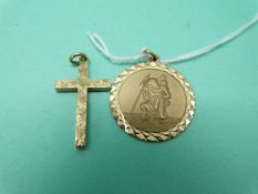A 9ct gold St Christopher and a 9ct gold cross pendant (8.