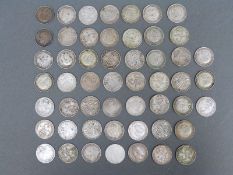 A collection of silver threepence pieces,