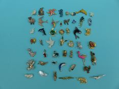 A collection of animal, fish and bird related brooches to include Monet, Ambassador,