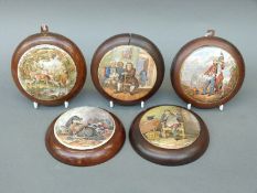 Five Prattware pot lids including 'War', 'Deer Driking', 'The Times', 'Garibaldi' and 'Dr Johnson',