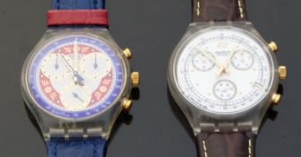 Two Swatch chronograph wristwatches, one with silvered face,