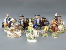 A collection of Staffordshire figures including Sir Campbell, boxers Tom Molyneux and Tom Crabbe,