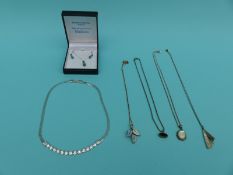 A collection of necklaces including silver and Swarovski