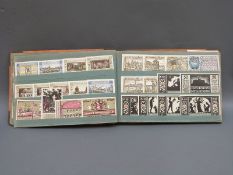 An album containing approximately 450 Notgeld German notes with a variety of subjects including