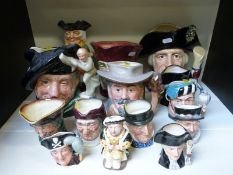 A collection of Royal Doulton character and toby jugs,