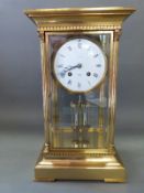 L'Epee French brass four glass two train mantel clock, striking on a bell,