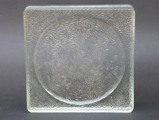 A glass patterned wine coaster/tray,