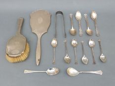 A quantity of hallmarked silver cutlery including a set of six teaspoons and Georgian sugar tongs