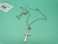 An 18ct white gold cross on 9ct white gold chain (7.