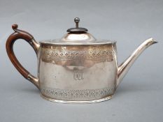 A Victorian hallmarked silver teapot, Sheffield 1884, marks rubbed probably Roberts and Belk,