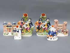 A collection of Staffordshire spill vases and a cottage including Sebastopol,