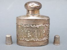 An Edward VII hallmarked silver bottle with a figural scene, Birmingham 1903 maker Levi & Salaman,