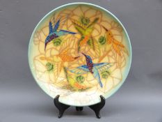 A Sally Tuffin for Dennis China Works charger with hummingbird decoration marked no 20 and