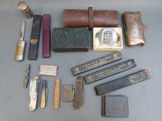 A collection of razors, knives, silver plated items,