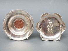A hallmarked silver coin-based bowl and a white metal bowl marked 925,