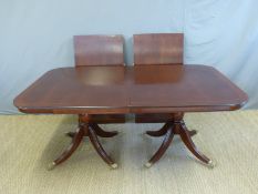 A reproduction dining room table (max length 304, minimum 183,