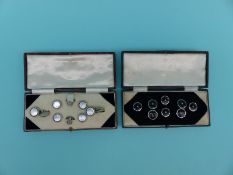 A cased set of cufflinks and studs with mother of pearl edged with onyx decoration,
