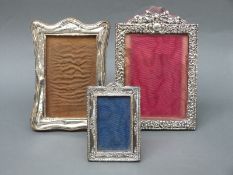 Three hallmarked silver Victorian photograph frames,