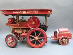 A wooden model of a traction engine with name England's Glory to canopy