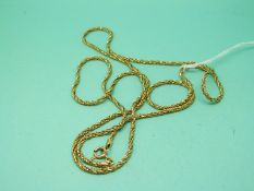 A 9ct gold rope twist necklace (11.