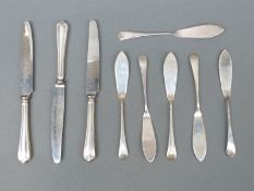 A set of six hallmarked silver butter knives,