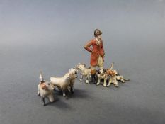 Two Austrian cold painted bronze miniature figure groups, one a huntsman and hounds,