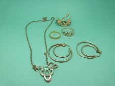 A 9ct gold wedding band, silver earrings, silver ring,