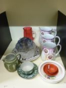 A Wedgwood Jasperware cup and saucer, another 19thC cup and saucer with relief moulded decoration,