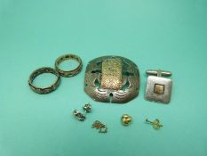 Two 9ct gold and silver rings, a silver brooch set with a panel of 18ct gold,