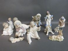 A collection of Lladro child figures including three Eskimos & flamenco dancer together with two
