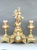 A large 19thC French onyx and gilt ormolu mantel clock garniture,