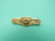 A 9ct gold brooch set with diamonds (Chester 1900)
