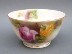 Royal Worcester pedestal bowl decorated with roses with puce mark to base,