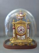 A mid to late 19thC French clock in gilt metal with painted Sevres style panels,