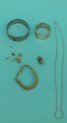 A silver bangle, silver necklace, 9ct gold knot earrings,