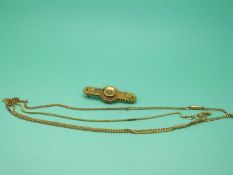 Two 9ct gold chains and a 15ct gold Victorian brooch