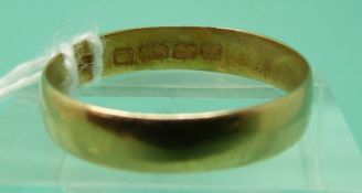 A 22ct gold wedding band, 2.