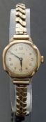 Rotary 9ct gold ladies wristwatch with black Arabic numerals, blued hands,