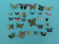 A collection of butterfly brooches to include enamel set, K and T, Monet,
