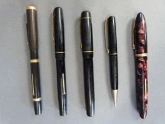 A collection of vintage pens including the Croxley pen, Swan Mabie Todd & Co self filler,