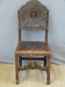 A 19thC continental tooled leather chair