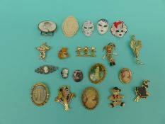 A collection of brooches to include cameos, novelty, Italian masks, enamelled jack-in-the-box,