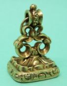 A Victorian seal / ingot set with carved agate depicting a crest