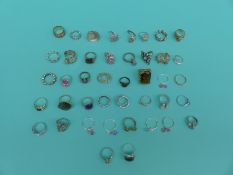 A collection of 42 silver/white metal rings including labradorite,