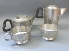 An Art Deco pewter Roundhead style tea set