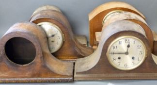Four largely Napoleon hat style mantel clocks for the restorer with Arabic numerals and two train