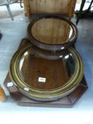 Three mirrors including oval bevelled glass example